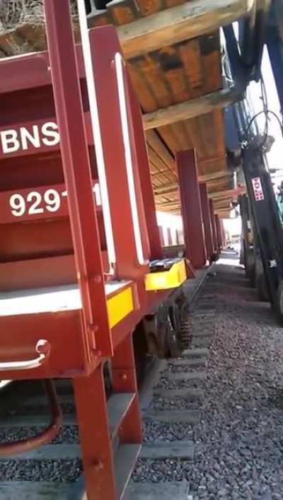 Whst could go wrong trying to unload 100 tonnes of steel with 3 forklifts?