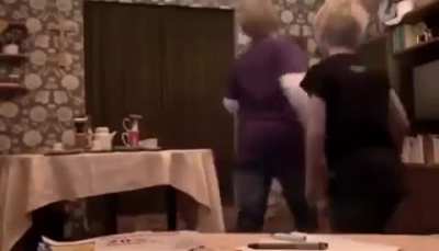 Kids doing tablecloth tricks