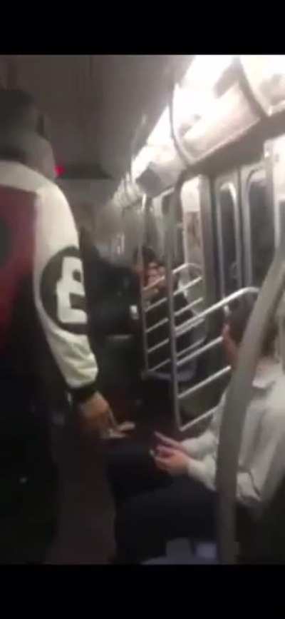 Man Slaps Soul Out of Girl on NY Subway