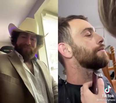 Trimming the beard.