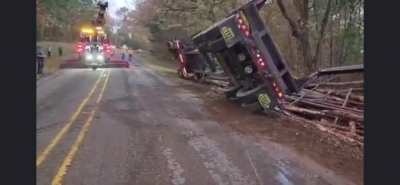 Tow truck operator VS log truck