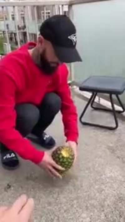 Opening up a pineapple