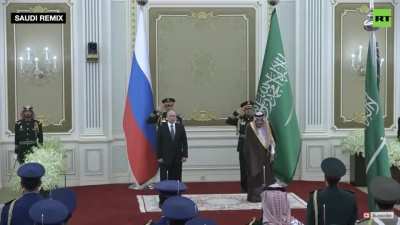 Putin listens to the Saudi’s rendition of the Russian anthem