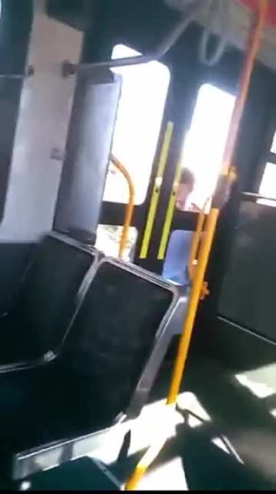 Man threatening another guy inside the bus ?