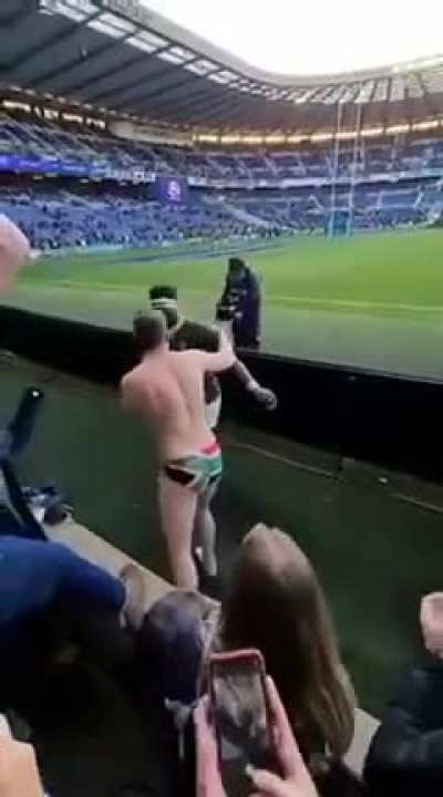 South Africa's rugby team's captain signing a fan's underwear