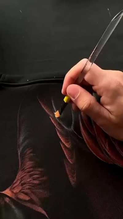 a bleach artist named nik vikond turned this black hoodie into a piece of art ?