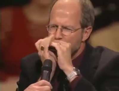 Magical musician takes Harmonica to a level 99.. ?