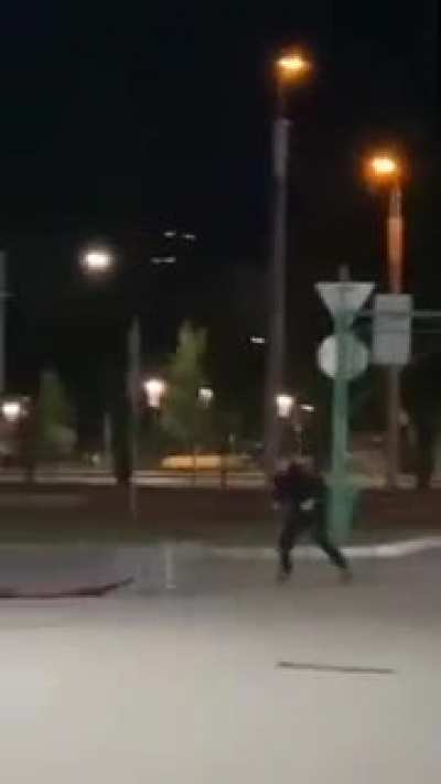 Riding in a shopping cart behind a car
