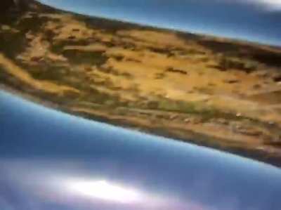 Camera falls from a plane and lands near...