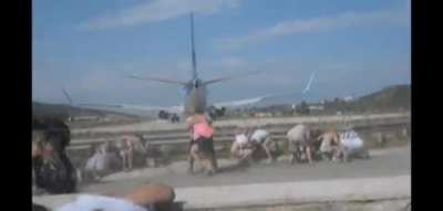 Standing behind an Airplane about to take off