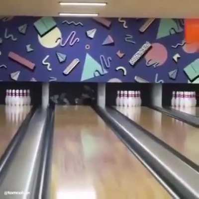 Someone created a robot that can... "bowl" if you can still call it that.