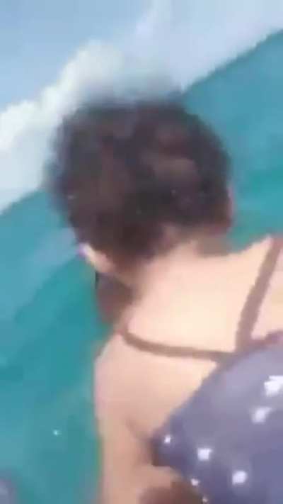 Good job with this man saving a toddler floating in the middle of the sea.