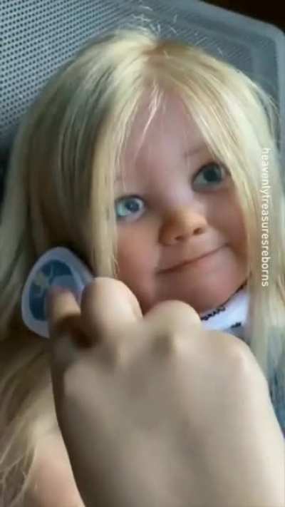 Brushing a dolls hair