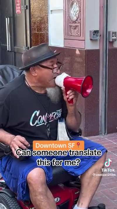 man in wheel chair on megaphone (San Francisco) ?