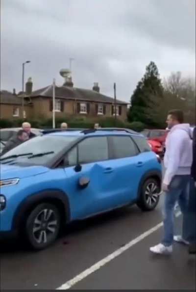 Lady tries driving away after hitting Tesco employee