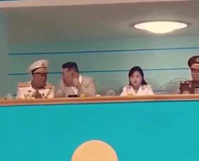 Kim jong un watching a volleyball game