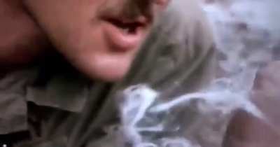 American Soldiers smoking weed out of a shotgun barrel in Vietnam (1970)