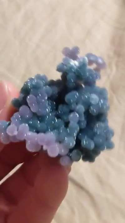 I sold rare minerals for many years and this is one of the few I kept. "Grape Agate" I imported directly from the miner in Indonesia, 2017. Essentially Quartz with iron (purple) and nickel (or possibly chromium, green). Sorry about my left hand being shak