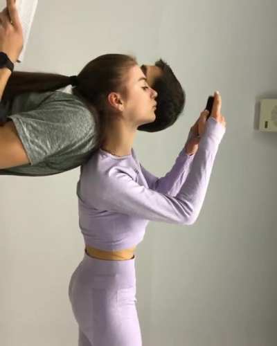 Showing off new sneakers.