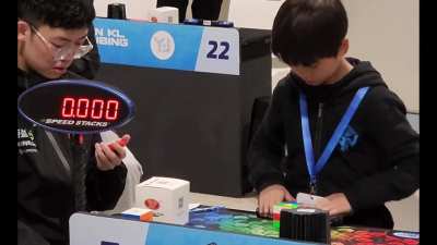 9 year old YiHeng Wang just set the world record for the fastest average time to solve a Rubik's cube (4.69 secs)