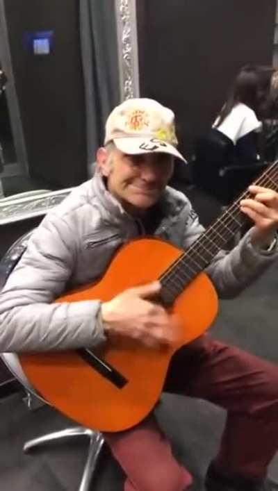 Old man plays "The Good, The Bad and The Ugly" all by himself.