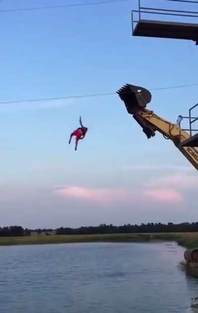 WCGW back flipping off an excavator.