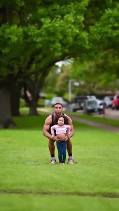 Father and Daughter cheerleading team
