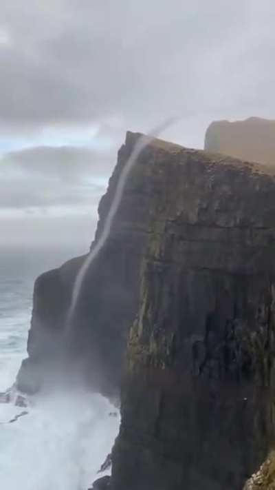 Tornado carries seawater up a cliff
