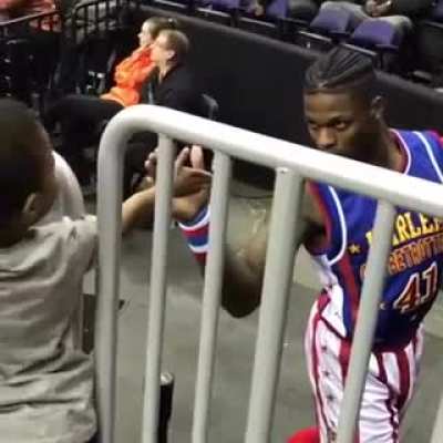 Taking the extra time to make this fan's "high five" a memorable one