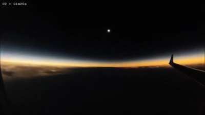 A solar eclipse mid flight