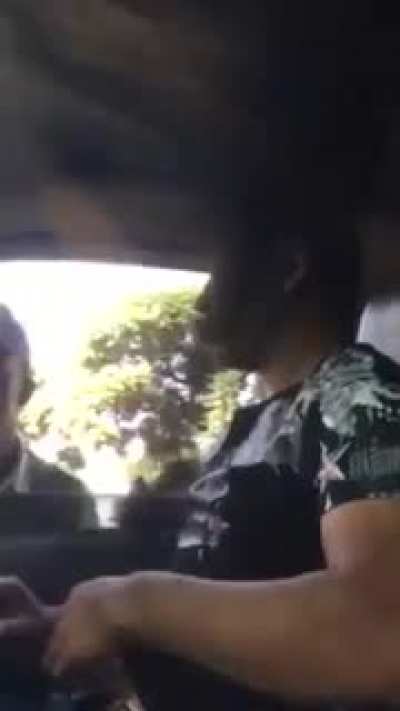 African Cop vs Chinese tourist. He trying to get a quick buck they play the I dont speak English card ??