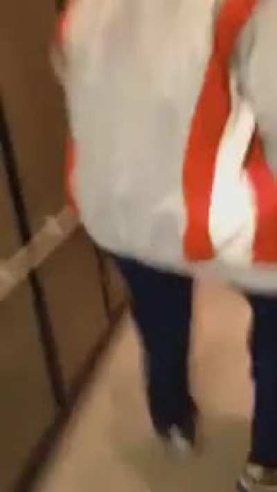 Sneaking a friend into a movie theater while dressed as one person.