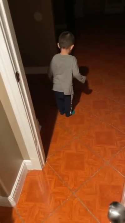 Kid notices his shadow for the first time ever
