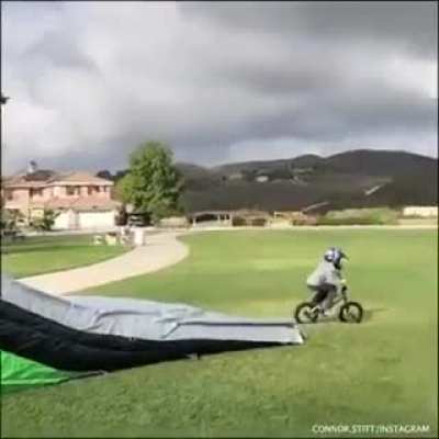Wow, 8-year-old backflipping on a bmx .