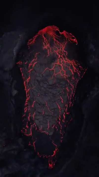 Lava flowing through a fracture in the crust