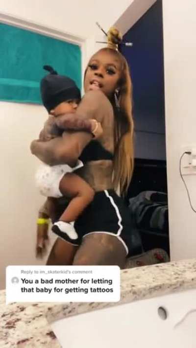 Girl tattoos her baby. Hope it’s fake