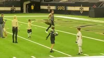 Brees and Brady hug it out after Brady beets Brees in playoffs. Brady throws a touchdown pass to Brees' son. Brady walks off to the NFC championship and Brees stays to play with his family. Sportsmanship done right.