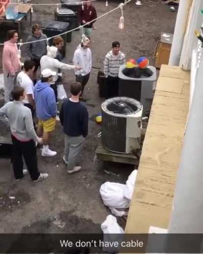 People watch beach balls battle it out