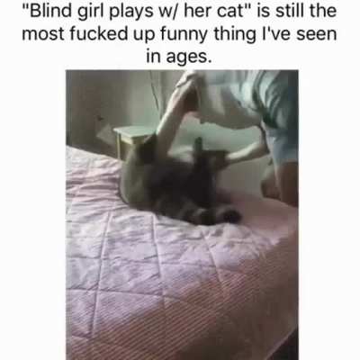 Blind girl plays with her cat ?