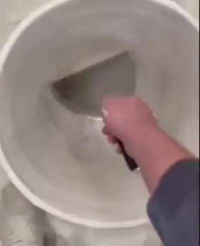 You need a curved putty knife